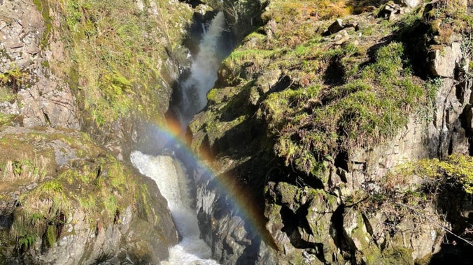 The spray from Aira Force and the spring sunshine creates a rainbow